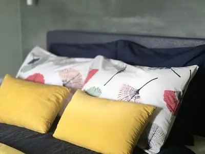 Un ou plusieurs lits dans un hébergement de l'établissement Gîtes de charme 