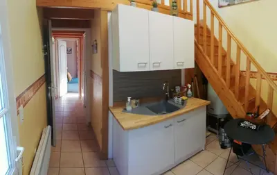 Cuisine ou kitchenette dans l'établissement Charmante petite dépendance
