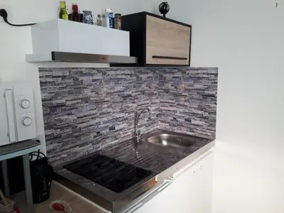 Cuisine ou kitchenette dans l'établissement chez LOLO