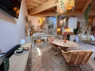Coin salon dans l'établissement Suite Bali Les Petits Plaisirs