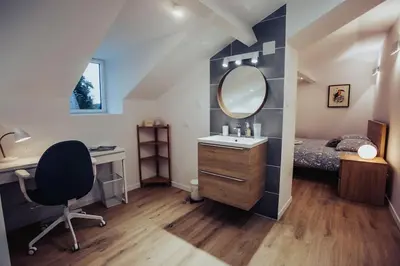 Un ou plusieurs lits dans un hébergement de l'établissement Appartement de charme, Angers Belle-Beille