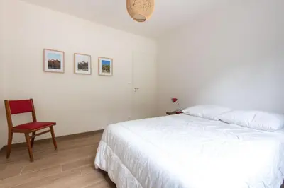 Un ou plusieurs lits dans un hébergement de l'établissement Belle maison proche de la mer pour 6 personnes