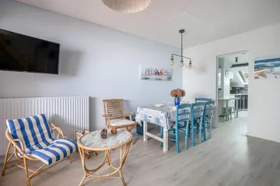 Télévision ou salle de divertissement dans l'établissement Face à la mer, appartement sous les toits pour 4