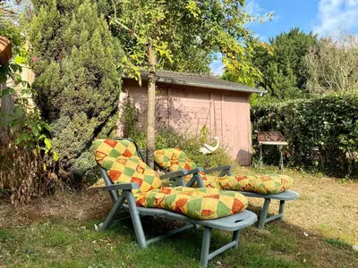 Jardin de l'établissement Maison au calme avec jardin clos, 25 km des plages, 2 chambres, climatisation, Wifi, parking sécurisé - FR-1-306-1225