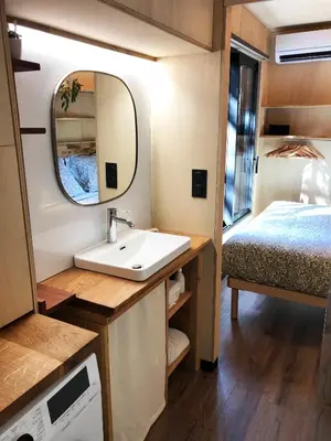 Un ou plusieurs lits dans un hébergement de l'établissement Vaimiti, cabane cosy sous les pins (50m de la plage)