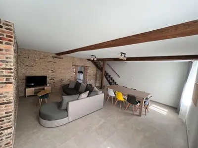 Télévision ou salle de divertissement dans l'établissement Gîte Les petits pirons