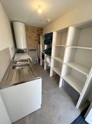 Cuisine ou kitchenette dans l'établissement Gîte Les petits pirons