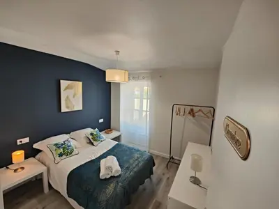 Un ou plusieurs lits dans un hébergement de l'établissement Charmante maison de Ville , 4 personnes , LES HERBIERS