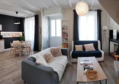 Coin salon dans l'établissement Charmante maison de Ville , 4 personnes , LES HERBIERS