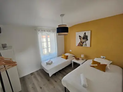 Un ou plusieurs lits dans un hébergement de l'établissement Charmante maison de Ville , 4 personnes , LES HERBIERS