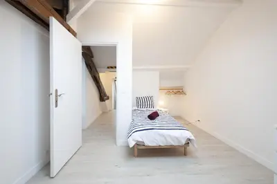 Un ou plusieurs lits dans un hébergement de l'établissement grand gîte terrasse vue Loire et château d'Ancenis