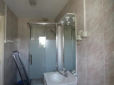 Salle de bains dans l'établissement Gîte Orchidée