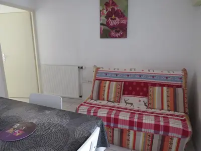 Un ou plusieurs lits dans un hébergement de l'établissement Gîte Orchidée
