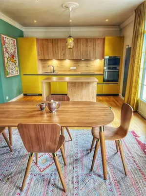 Cuisine ou kitchenette dans l'établissement St Nazaire Jardin des plantes superbe appartement