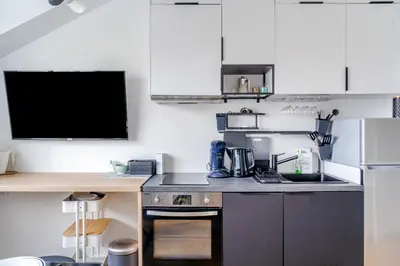 Cuisine ou kitchenette dans l'établissement Nouveau ! Ptit Lu - Appartement proche Loire