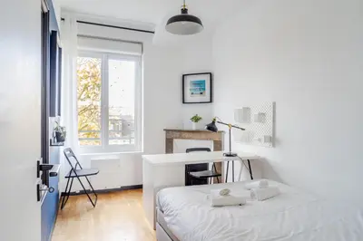 Un ou plusieurs lits dans un hébergement de l'établissement Nouveau ! Ptit Lu - Appartement proche Loire