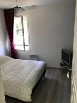 Télévision ou salle de divertissement dans l'établissement Agréable appartement dans Résidence à Pornichet