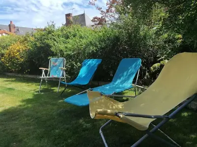 Jardin de l'établissement Maison de vacances vue mer