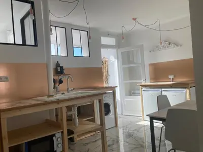 Cuisine ou kitchenette dans l'établissement Maison chapi