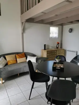 Coin salon dans l'établissement Le Cosy d'Eden