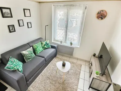 Coin salon dans l'établissement Into the Wild - T2 Cosy tout confort
