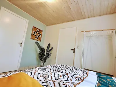 Un ou plusieurs lits dans un hébergement de l'établissement Into the Wild - T2 Cosy tout confort