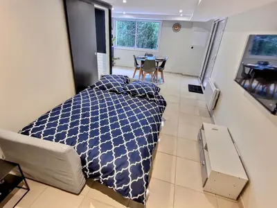 Un ou plusieurs lits dans un hébergement de l'établissement Le Petit Rocher 30m2- Studio standing 3 étoiles