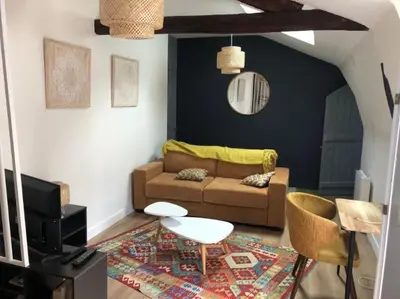 Coin salon dans l'établissement Appartement en cœur de ville