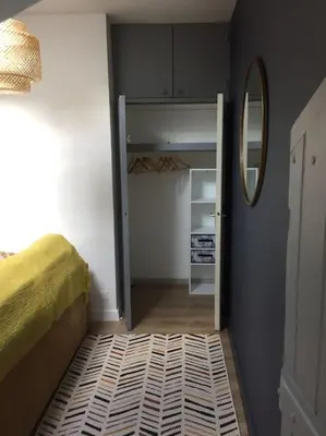 Un ou plusieurs lits dans un hébergement de l'établissement Appartement en cœur de ville
