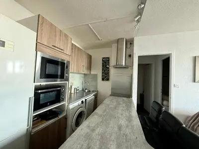 Cuisine ou kitchenette dans l'établissement Appartement familial avec vue sur mer, parking privé - FR-1-652-24