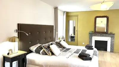 Coin salon dans l'établissement Suite Junior Layon - Maison Bossoreil