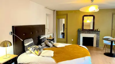 Coin salon dans l'établissement Suite Junior Layon - Maison Bossoreil