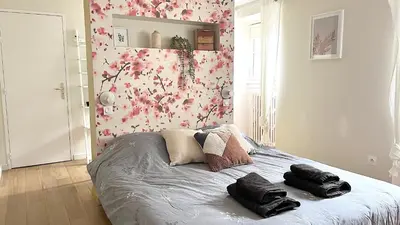 Un ou plusieurs lits dans un hébergement de l'établissement Chambre Crémant - Maison Bossoreil
