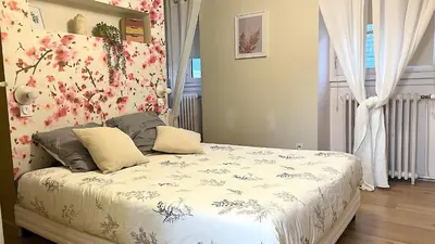 Un ou plusieurs lits dans un hébergement de l'établissement Chambre Crémant - Maison Bossoreil