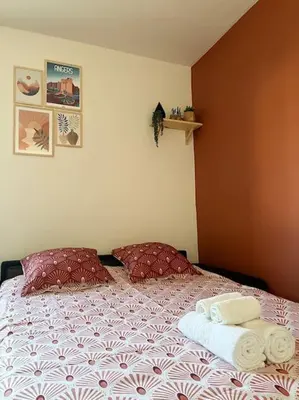 Un ou plusieurs lits dans un hébergement de l'établissement Studio - Cosy Kaza
