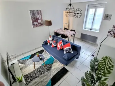 Coin salon dans l'établissement Superbe Type 2 - Cosy et Chaleureux