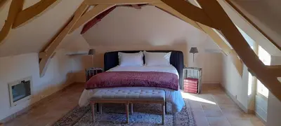 Un ou plusieurs lits dans un hébergement de l'établissement Domaine de Vaufleury - La Maison de l'Escuiller