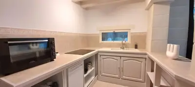 Cuisine ou kitchenette dans l'établissement Domaine de Vaufleury - La Maison de l'Escuiller