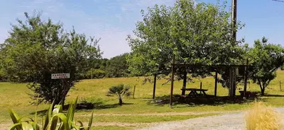 Jardin de l'établissement Gite Spacieux 4 personnes - 5km du Parc