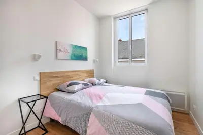 Un ou plusieurs lits dans un hébergement de l'établissement Aristide#2 - T2 calme et lumineux avec Terrasse
