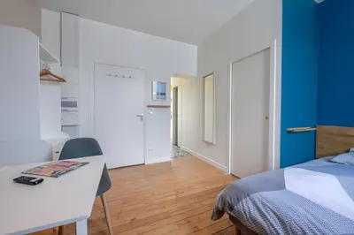 Un ou plusieurs lits dans un hébergement de l'établissement Aristide#3 - Studio Lumineux avec sa jolie terrasse