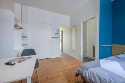 Un ou plusieurs lits dans un hébergement de l'établissement Aristide#3 - Studio Lumineux avec sa jolie terrasse