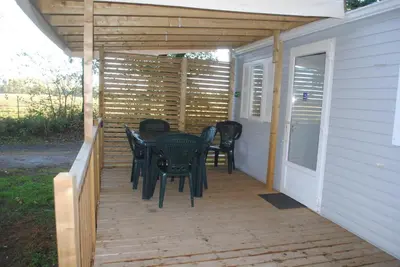 Terrasse ou espace extérieur de l'établissement Mobil Home camping 3*** piscine chauffée