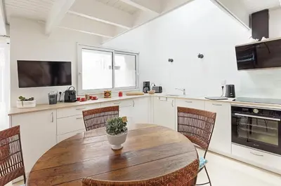Cuisine ou kitchenette dans l'établissement La Galerie Pornic - Maison Lotus