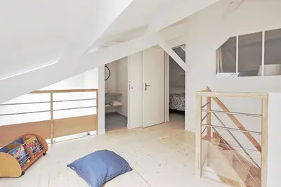 Un ou plusieurs lits dans un hébergement de l'établissement La Galerie Pornic - Maison Lotus