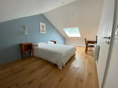 Un ou plusieurs lits dans un hébergement de l'établissement Maisonnette confortable à Pornic