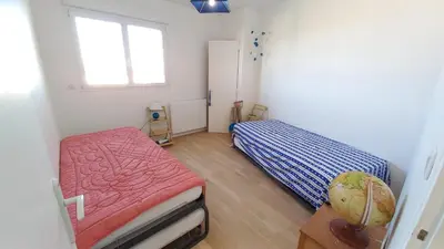 Un ou plusieurs lits dans un hébergement de l'établissement LA PEROUSE - Appartement 4ème étage - 2 chambres vue mer