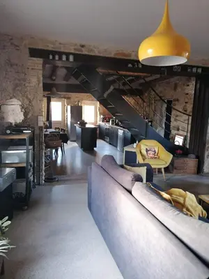 Coin salon dans l'établissement Gîte des Lilas