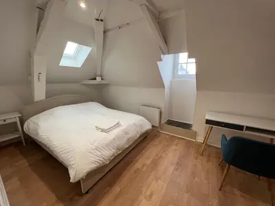 Un ou plusieurs lits dans un hébergement de l'établissement Le cottage de l’Oudon