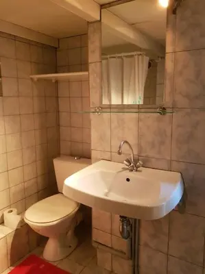 Salle de bains dans l'établissement Petit studio la madeleine